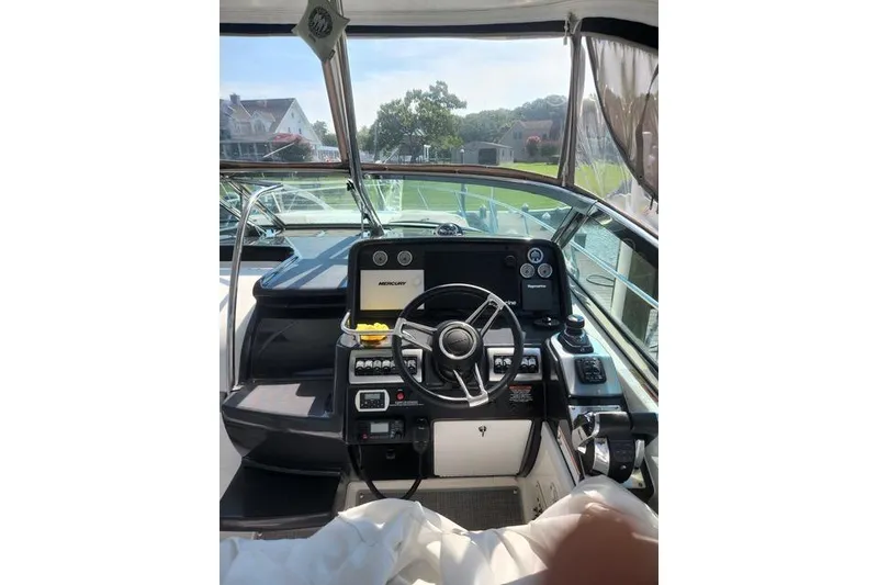 Slide: The Image of 2019 Formula 34 Performance Cruiser helm with modern controls and navigation equipment. - 3