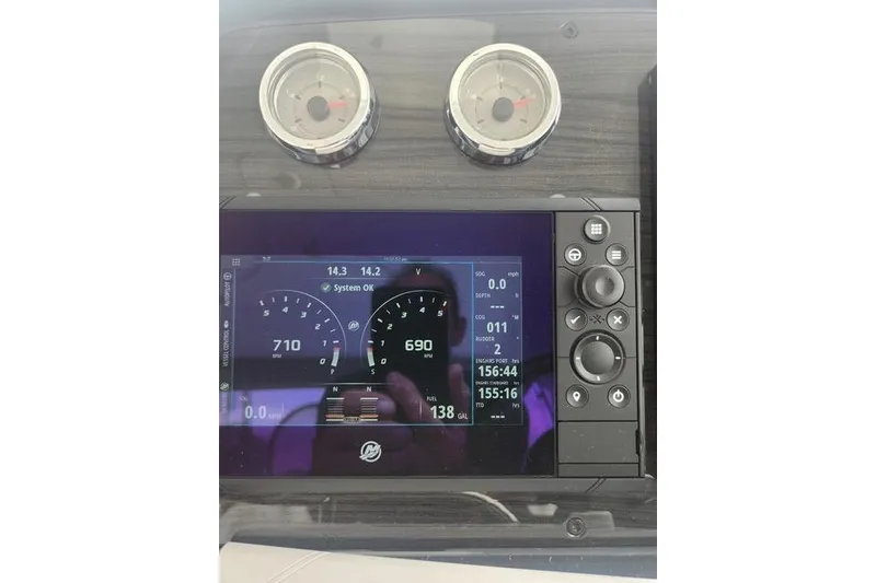 Slide: The Image of Dashboard of 2019 Formula 34 Performance Cruiser with digital gauges and controls. - 8