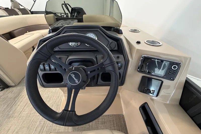 Slide: The Image of 2026 Bentley Pontoons Legacy 223 Swingback dashboard with steering wheel and control panel. - 13