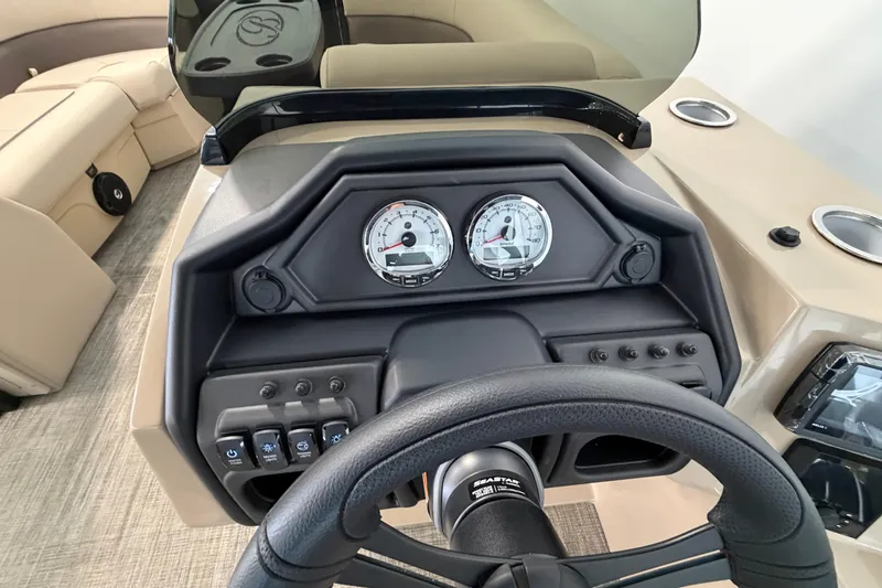 Slide: The Image of 2026 Bentley Pontoons Legacy 223 Swingback dashboard with steering wheel and gauges. - 14