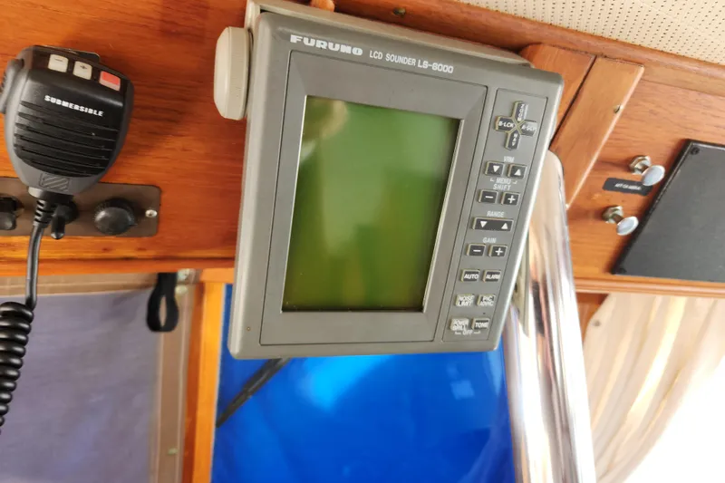 Slide: The Image of Furuno LCD sounder and radio on 1983 Grand Banks 36 Classic boat. - 17