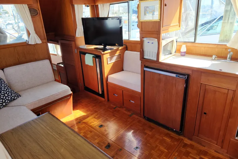 Slide: The Image of Interior of 1983 Grand Banks 36 Classic yacht with wood finish and modern amenities. - 8