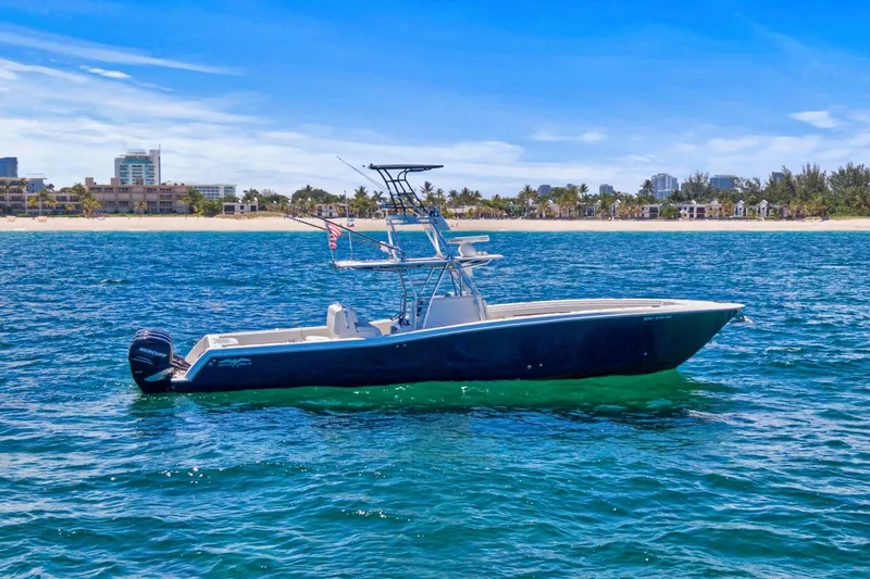 Slide: The Image of 2013 Invincible 42 Open Fisherman on open sea. - 9