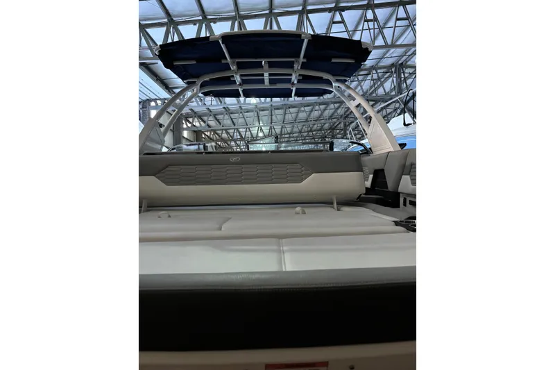 Slide: The Image of 2021 Cobalt A29 boat interior with sleek seating and modern design. - 14