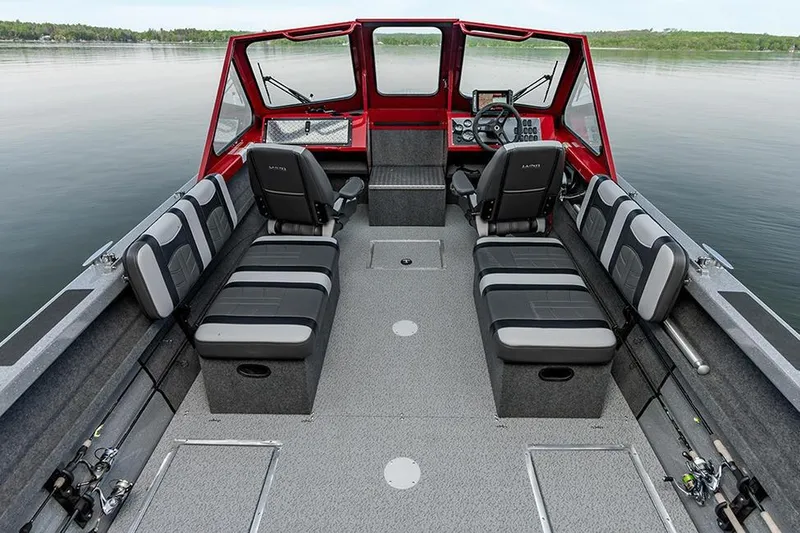 Slide: The Image of 2026 Lund 185 Heavy Gauge boat interior with seating and storage compartments. - 22