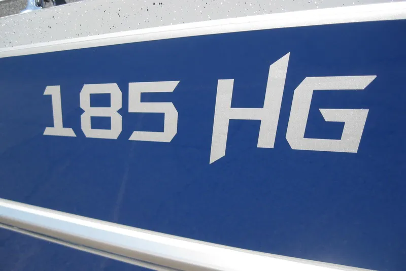 Slide: The Image of 2026 Lund 185 Heavy Gauge boat logo on blue exterior. - 4