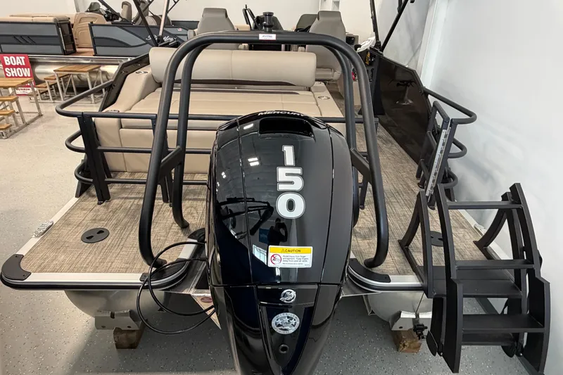 Slide: The Image of 2026 Bentley Pontoons Legacy 223 Swingback with 150 HP engine at boat show. - 5