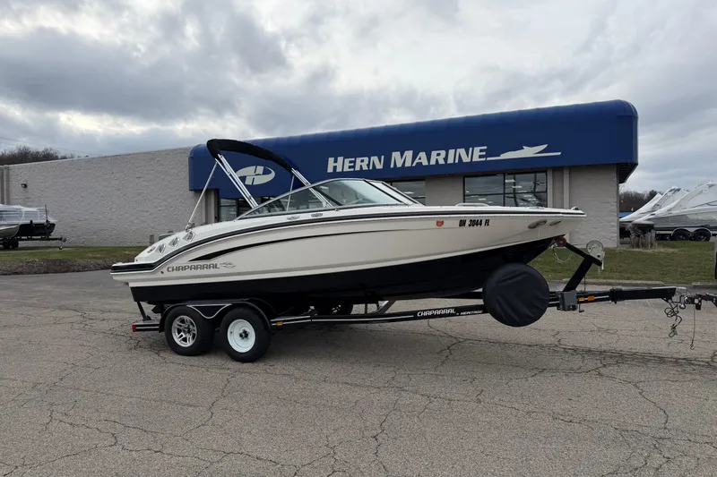 The Image of 2014 Chaparral 206 SSi boat on trailer at Hern Marine dealership. - 0