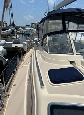 Slide: The Image of 2005 Island Packet 445 sailboat docked at marina. - 41