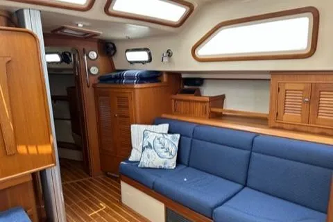 Slide: The Image of Interior of a 2005 Island Packet 445 yacht with blue upholstery. - 6