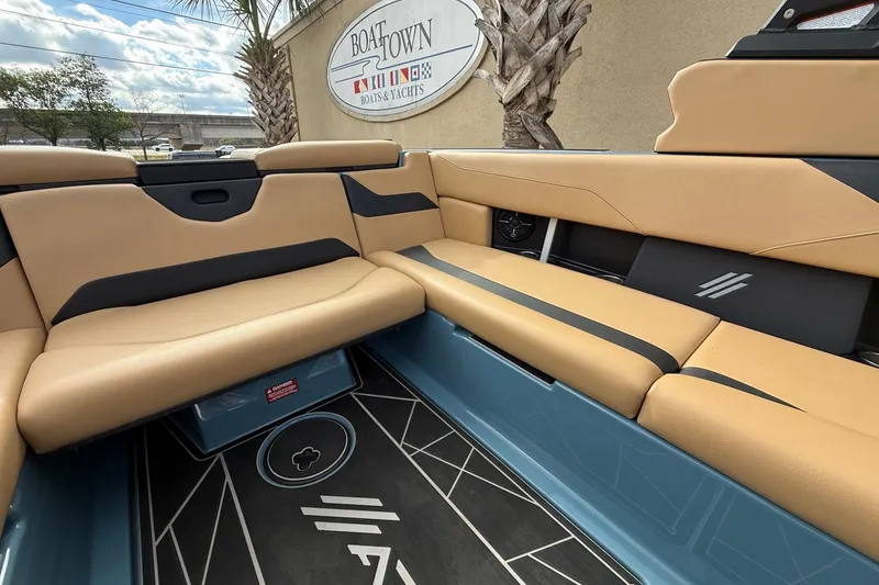 Slide: The Image of Luxurious interior of 2023 ATX boat with tan and black seating at Boat Town. - 15