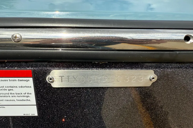 Slide: The Image of Metallic plate with serial number TIX0649EC323 on ATX model, 2023. - 17