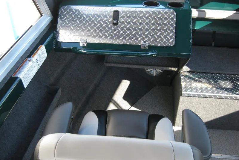 Slide: The Image of Interior of 2026 Lund 200 Heavy Gauge boat with modern seating and dashboard. - 17