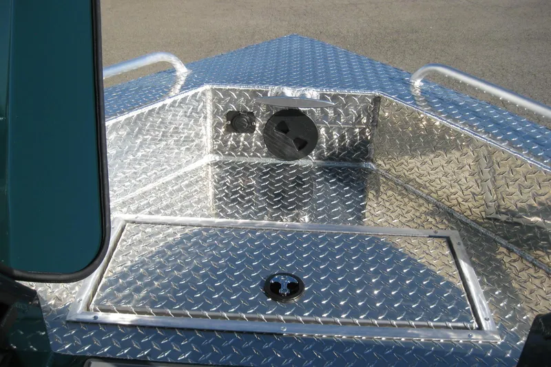 Slide: The Image of Interior of 2026 Lund 200 Heavy Gauge boat with steering wheel and control panel. - 19