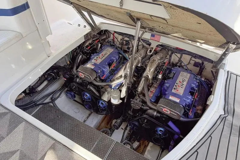 Slide: The Image of Twin engines in a 2004 Formula 400 Super Sport Crossover boat, engine compartment view. - 11
