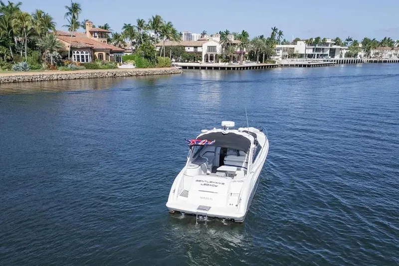 Slide: The Image of Aerial view of 2004 Formula 400 Super Sport Crossover boat on a scenic waterway. - 2