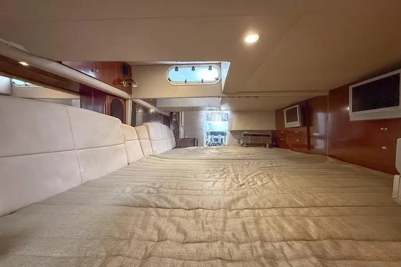 Slide: The Image of Interior cabin of 2004 Formula 400 Super Sport Crossover with bed and porthole window. - 9