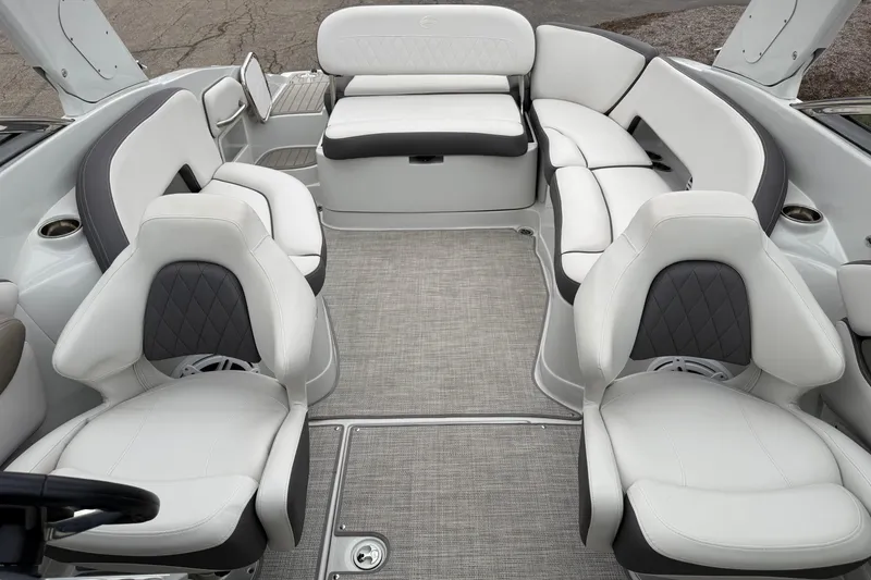 Slide: The Image of 2023 Crownline 280 SS boat interior with luxurious seating and modern design. - 10