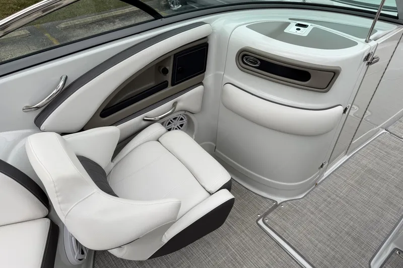 Slide: The Image of 2023 Crownline 280 SS boat interior with sleek seating and modern design. - 16