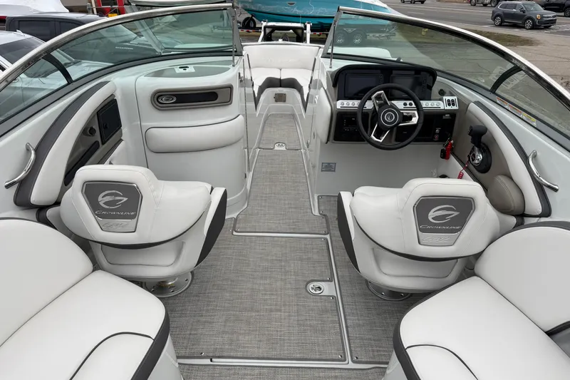 Slide: The Image of 2023 Crownline 280 SS boat interior with modern helm and luxurious seating. - 4
