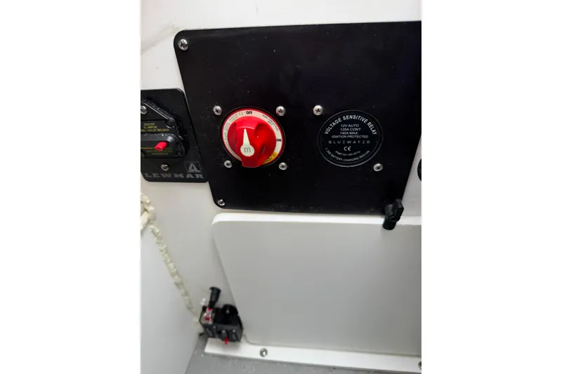 Slide: The Image of Control panel of 2023 Crownline 280 SS boat with voltage sensitive relay and switch. - 7