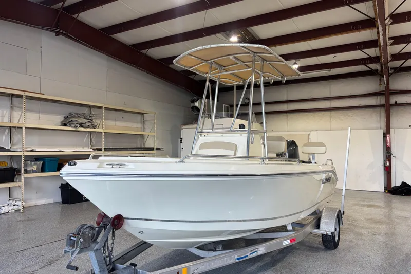 Slide: The Image of 2016 Release 180 CC boat on trailer in indoor storage facility. - 6
