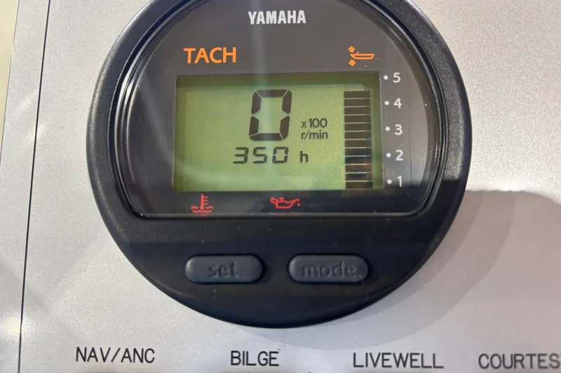 Slide: The Image of Yamaha tachometer display showing 350 hours on a 2016 Release 180 CC boat. - 8