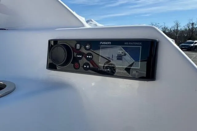 Slide: The Image of 2020 Yamaha Boats 242X E-Series audio control panel with Fusion MS-RA70NSX system. - 10