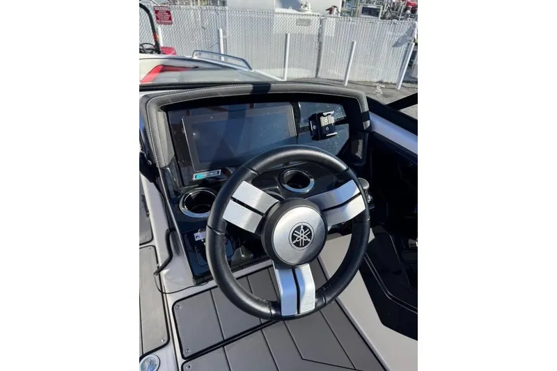 Slide: The Image of 2020 Yamaha Boats 242X E-Series steering wheel and dashboard close-up. - 26