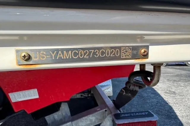 Slide: The Image of 2020 Yamaha Boats 242X E-Series hull identification number plate, close-up view. - 31