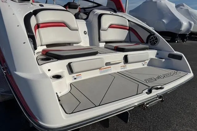 Slide: The Image of 2020 Yamaha Boats 242X E-Series, rear view with seating and swim platform. - 7