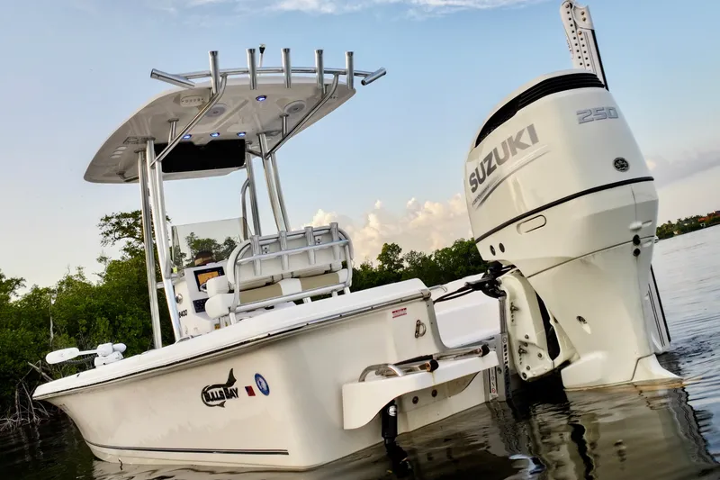 Slide: The Image of 2020 Bulls Bay 2400 boat with Suzuki 250 engine on calm water. - 17