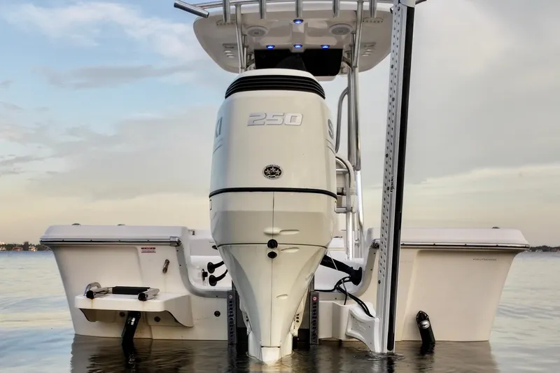 Slide: The Image of 2020 Bulls Bay 2400 boat with powerful outboard motor in calm waters. - 18