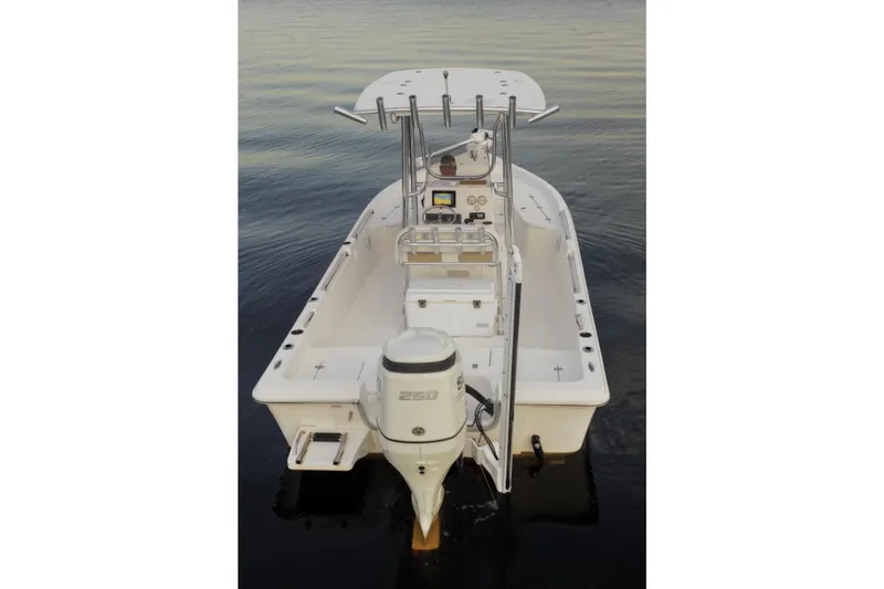 Slide: The Image of 2020 Bulls Bay 2400 boat with outboard motor on calm water. - 20