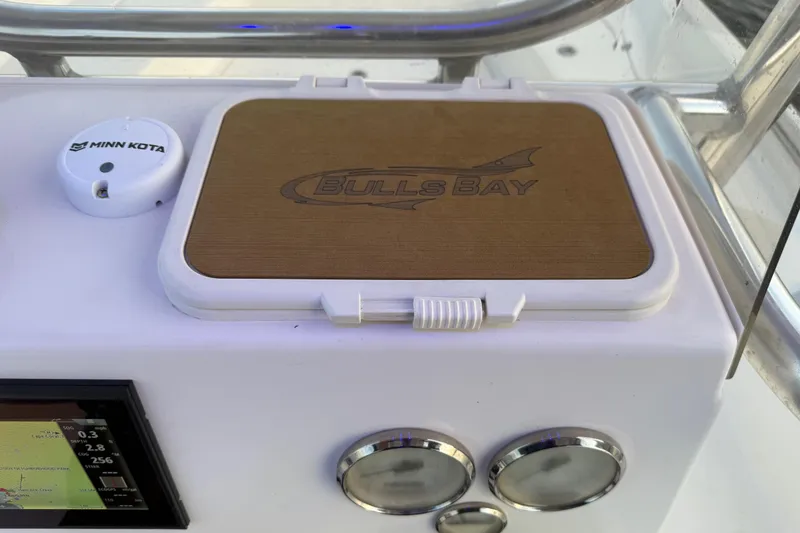 Slide: The Image of 2020 Bulls Bay 2400 boat console with Minn Kota device and control panel. - 26