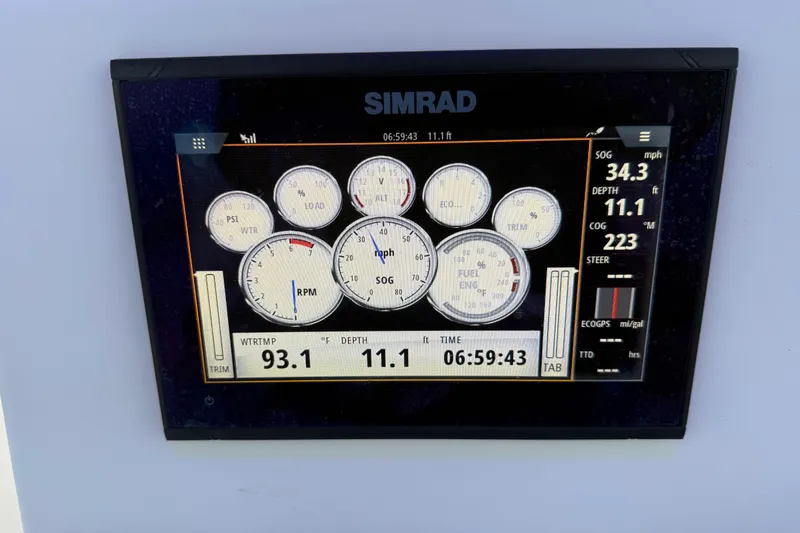Slide: The Image of Simrad display on 2020 Bulls Bay 2400 boat showing speed, depth, and engine metrics. - 29