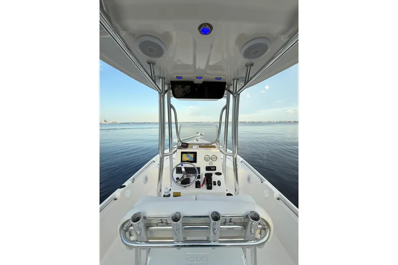 Slide: The Image of Interior view of 2020 Bulls Bay 2400 boat, showcasing helm and open water. - 31