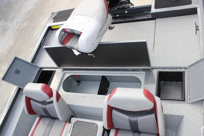 Slide: The Image of 2022 G3 Sportsman 1710 boat interior with seating and storage compartments. - 10