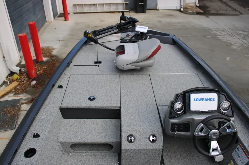 Slide: The Image of 2022 G3 Sportsman 1710 boat interior with Lowrance electronics and steering wheel. - 4