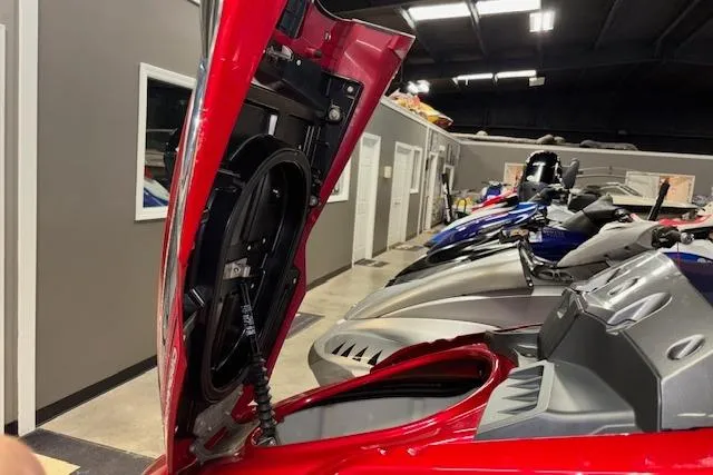 Slide: The Image of 2009 Yamaha WaveRunner FX Cruiser SHO with open storage compartment in showroom. - 16