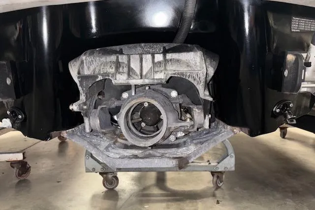 Slide: The Image of 2009 Yamaha WaveRunner FX Cruiser SHO jet propulsion system on display in a workshop. - 19