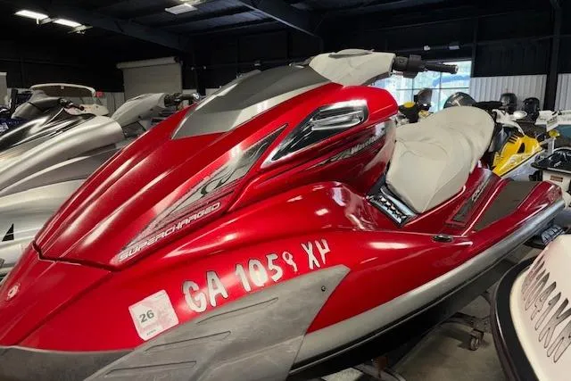 Slide: The Image of 2009 Yamaha WaveRunner FX Cruiser SHO, red, parked indoors, side view. - 3