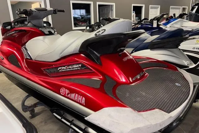 Slide: The Image of 2009 Yamaha WaveRunner FX Cruiser SHO in vibrant red, parked indoors. - 8