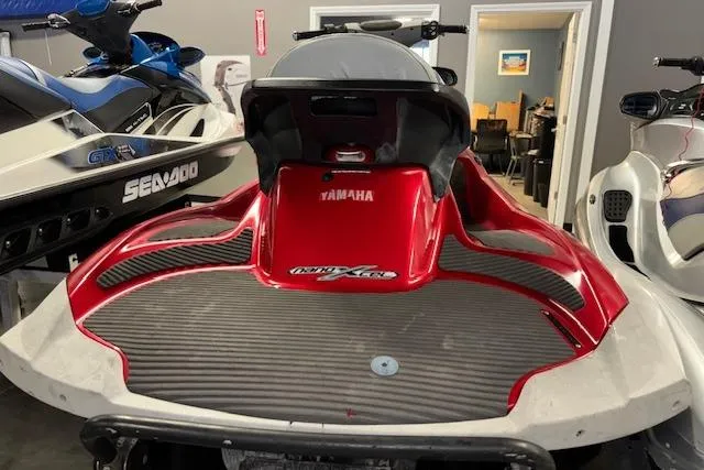 Slide: The Image of 2009 Yamaha WaveRunner FX Cruiser SHO in a showroom, red and black design. - 9