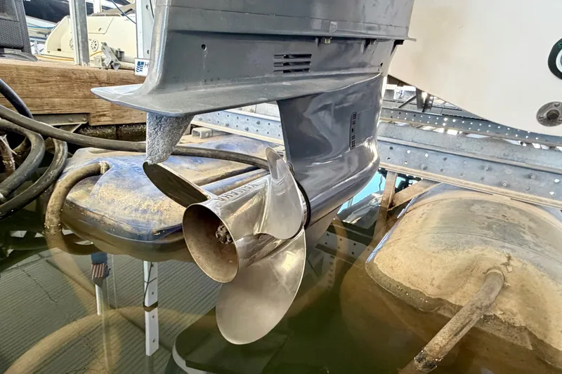 Slide: The Image of 2019 Grady-White Freedom 285 boat propeller in marina setting. - 38