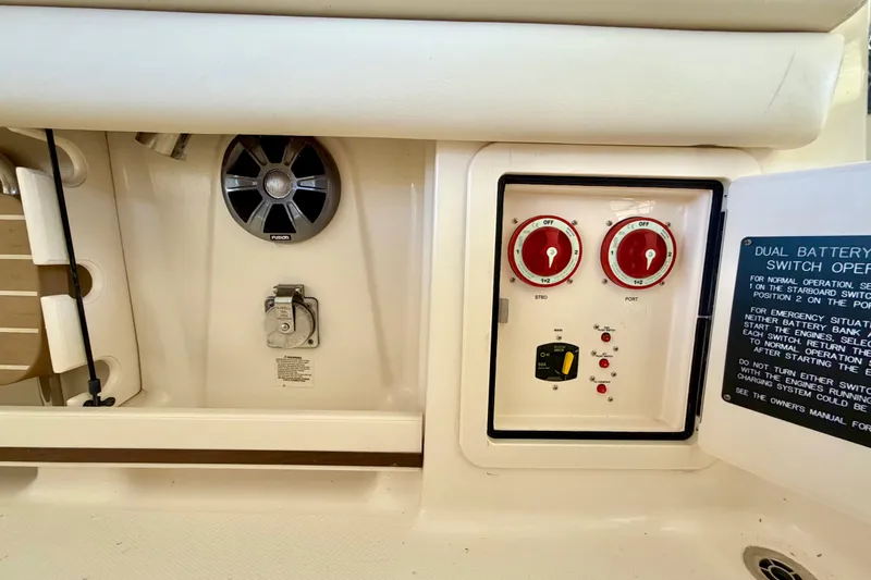 Slide: The Image of 2019 Grady-White Freedom 285 boat battery switch panel and speaker system. - 41
