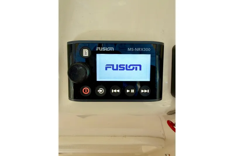 Slide: The Image of Fusion MS-NRX300 marine stereo display on 2019 Grady-White Freedom 285 boat. - 54