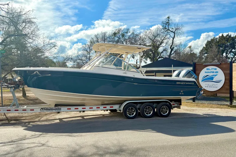 Slide: The Image of 2019 Grady-White Freedom 285 boat on trailer at Elite Marine dealership. - 61