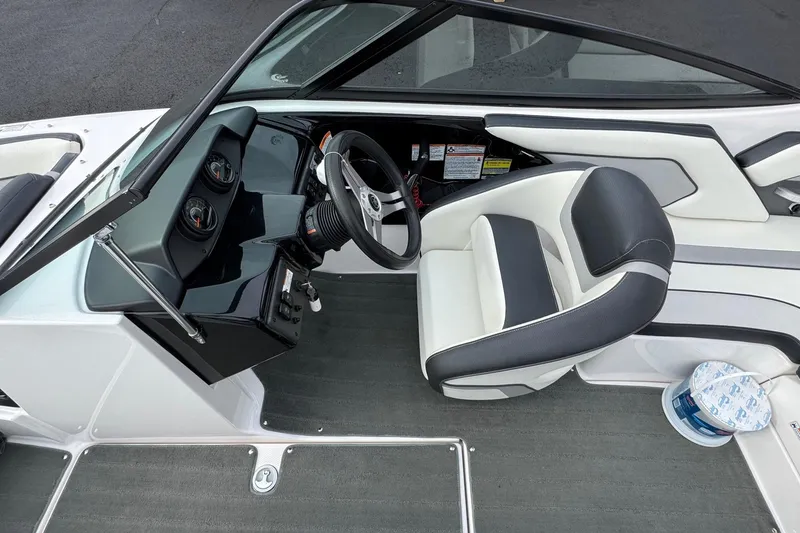 Slide: The Image of 2017 Yamaha Boats AR195 interior with steering wheel and seating. - 7