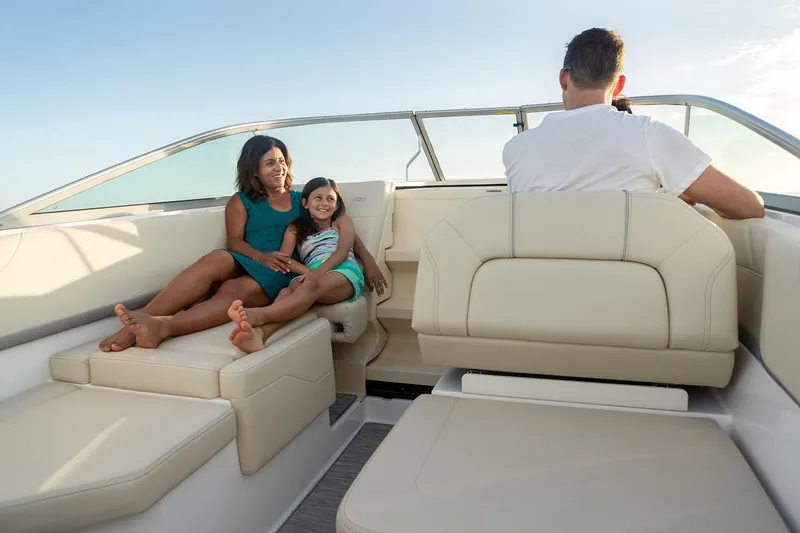 Slide: The Image of Open storage compartment on 2021 Regal 26 XO boat with life jackets and supplies. - 5